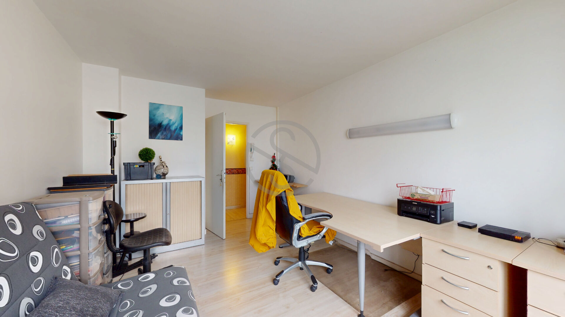 Appartement 4 pièces de 65 m²  avec cave et parking privé